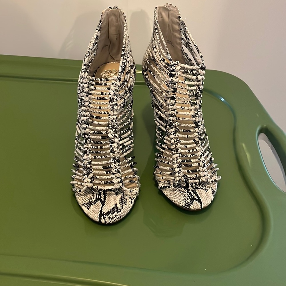 Never worn heels in white, black and grey